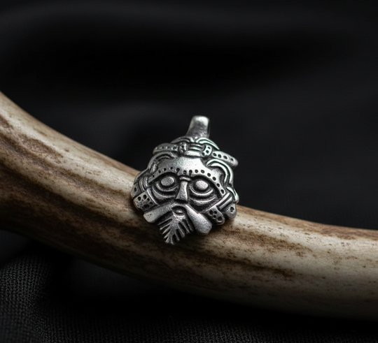 Mask pendant from Gnezdovo, silvered(Rus, X c.)